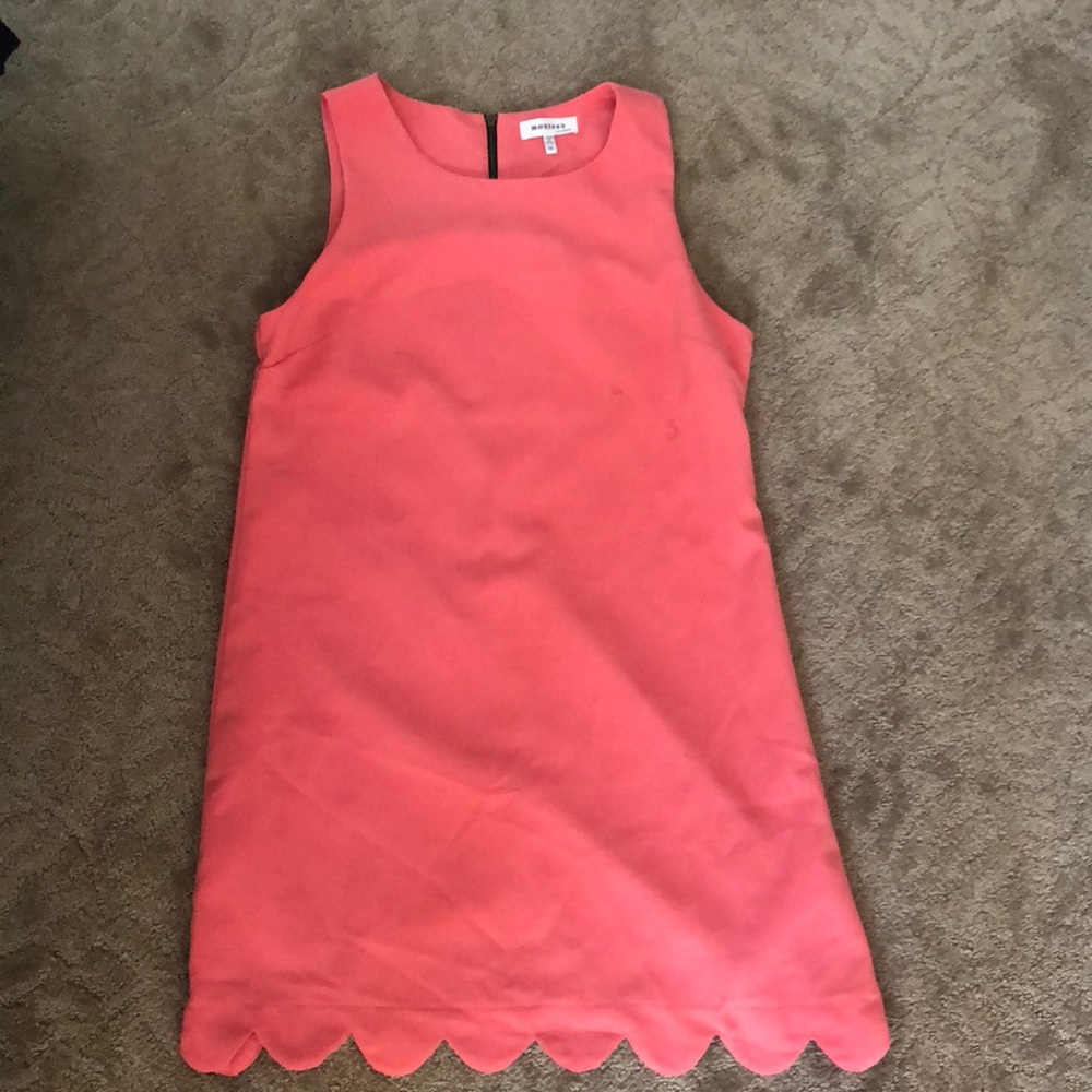 Peach A line dress with scalloped bottom.